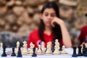woman-playing-chess-300x200.jpg